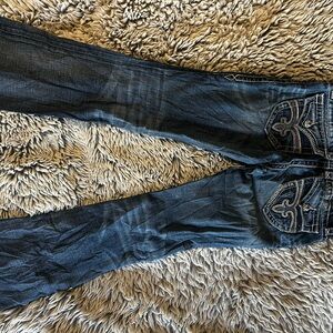 Rock Revival Blue Boot Cut Jeans with Distressed Look